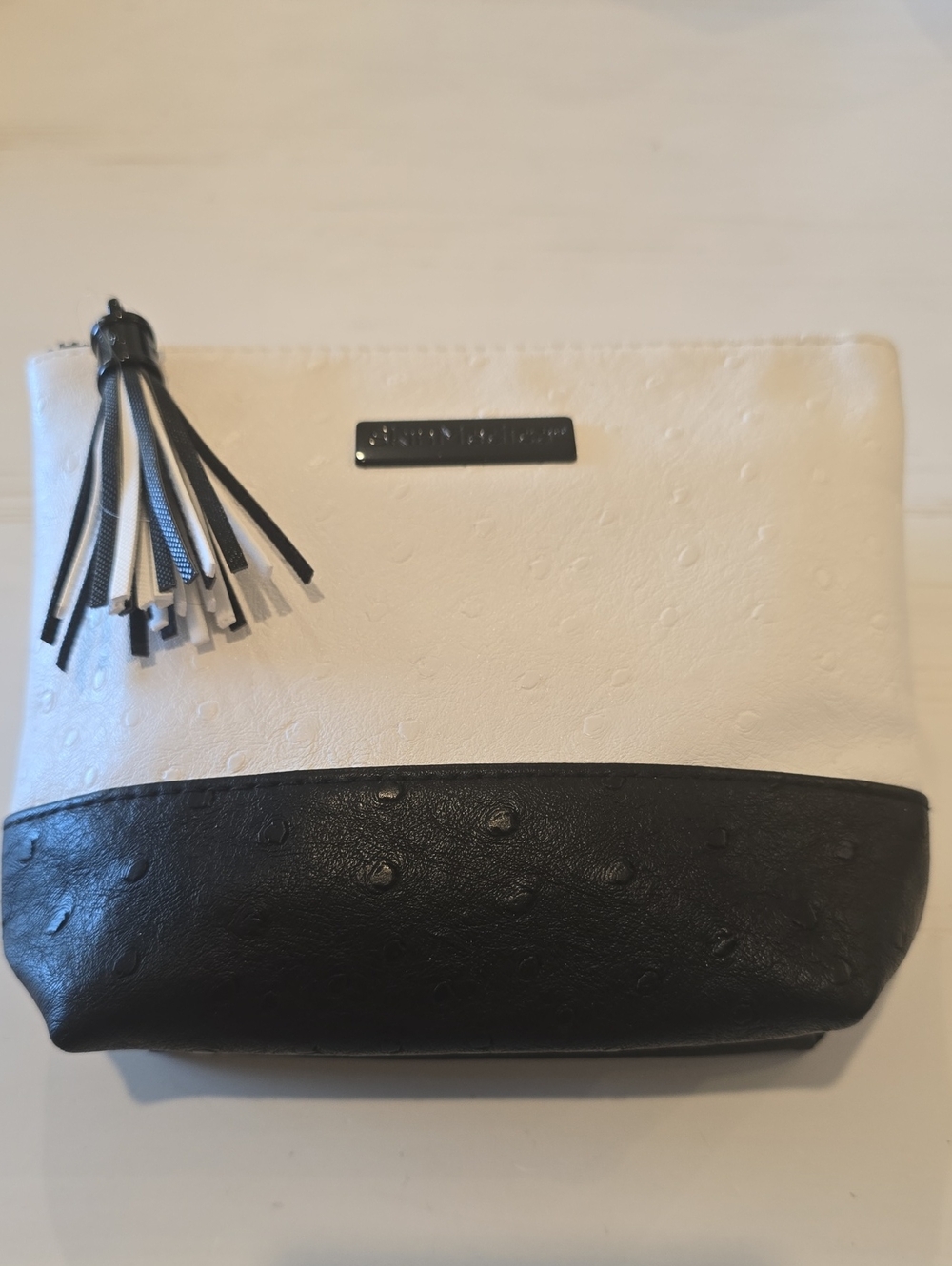 SkinMedica Two-Tone Black and White Cosmetic Pouch with Tassel